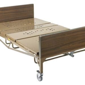 A metal hospital bed frame with adjustable sections is shown. It has a brown wooden headboard and footboard, and is mounted on wheels for easy mobility. The frame is designed for comfort and support.