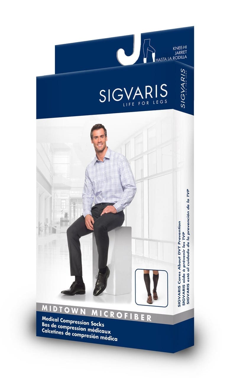 Packaging for Sigvaris Midtown Microfiber medical compression socks. It features a man in a light blue checkered shirt and dark pants sitting on a white box. The product description is shown in English, French, and Spanish.