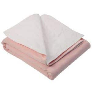 A folded pink blanket with a white interior lining.