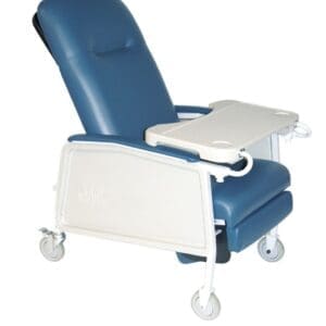 A blue medical recliner chair with a tray attached to the right armrest. The chair has wheels for mobility and an adjustable backrest for comfort.
