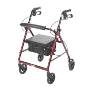 A red four-wheeled walker with handbrakes, a padded seat, and an under-seat storage pouch. The frame is sturdy and designed for mobility assistance.