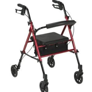 A red and black four-wheeled walker with a cushioned seat and storage compartment below. The walker has ergonomic handles and brakes.