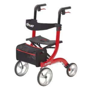 A red and black mobility walker with four large wheels, a storage bag, and adjustable handles. The walker is labeled Drive Nitro and features a seat and a backrest for support.