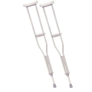 A pair of adjustable metal crutches with gray rubber grips and tips, designed to aid in walking. The crutches are positioned vertically against a plain white background.