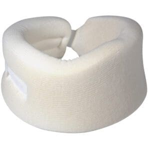 A soft, white foam neck brace with textured fabric surface, designed for medical support, is shown. It has a curved shape to accommodate the neck, featuring a velcro strap for adjustable fitting.