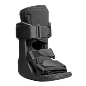 A black medical walking boot with adjustable straps and a cushioned footbed, designed to stabilize and support the foot and ankle during recovery from injuries.