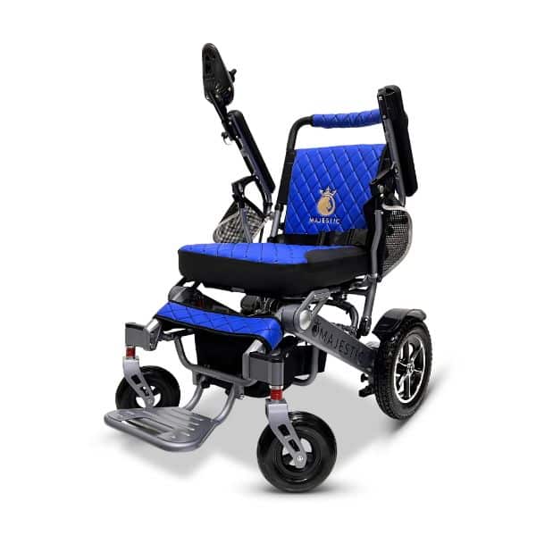 The MAJESTIC IQ-7000 features a stylish design with a vibrant blue padded seat, sturdy metal frame, large rear wheels, smaller front casters, footrest for reliability, and the Majestic logo prominently displayed on the backrest.