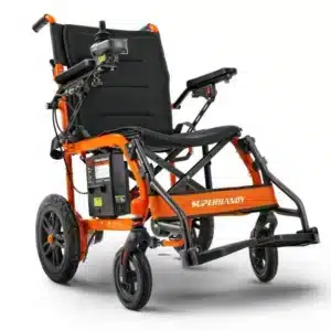 The SuperHandy Folding Electric Wheelchair boasts a black cushioned seat and backrest, an orange frame, adjustable footrests, and easy steering via a joystick on the armrest. Its large rear wheels paired with smaller front wheels enhance mobility.