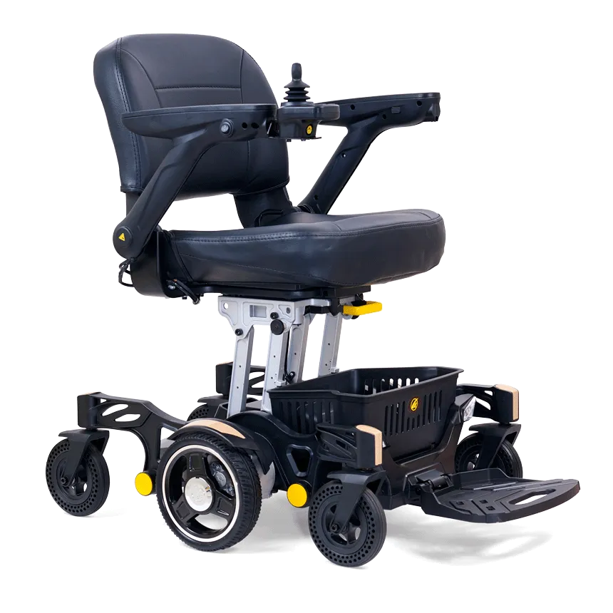 Meet the Buzzaround Carry On Powerchair in sleek black. This electric wheelchair includes a cushioned seat, backrest, armrests, joystick control, four sturdy wheels, and a foldable footrest—perfect for enhanced mobility wherever you go.